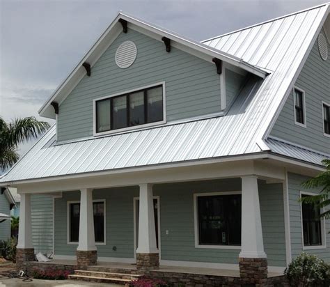 silver metal roof house|houses with charcoal metal roof.